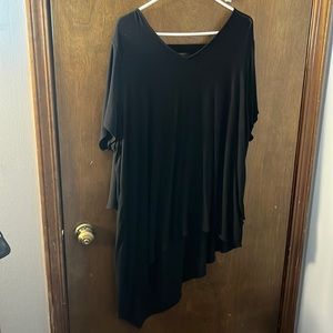 3 short sleeve shirts long in the back, shorter in the front.